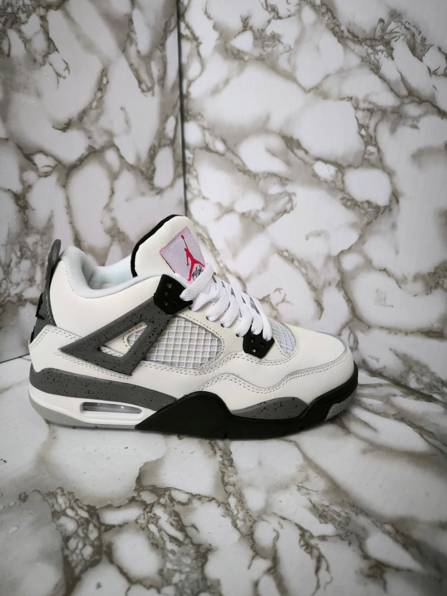 Jordan 4 White Cement